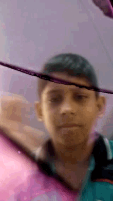 a close up of a person 's face in a mirror