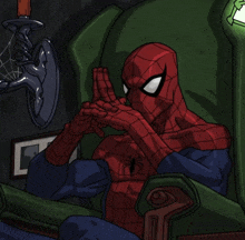 a drawing of spider man sitting in a chair