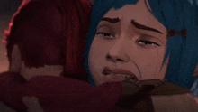 a woman with blue hair is crying while being hugged by a man .
