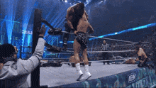 a wrestling ring with aaw on the side