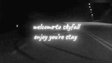 a black and white photo with the words welcome to skyfall enjoy your stay