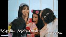 a video of a group of girls with the name achel malone on the bottom