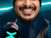 a man with a beard and a nose ring is smiling with a x in the corner