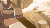 a person wearing white gloves is working on a piece of machinery