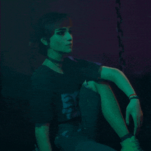 a person wearing a choker and a bracelet that says ' i love you ' on it