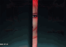 a woman with red hair is holding a lollipop in her mouth with the date 2022.07.01