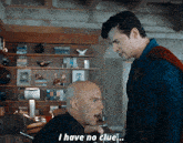a man in a wheelchair is talking to a man in a cape who says i have no clue