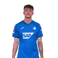 a man wearing a blue shirt with the word sap on the front