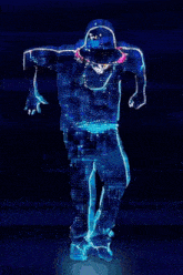 a silhouette of a man wearing a hat is dancing in a dark room