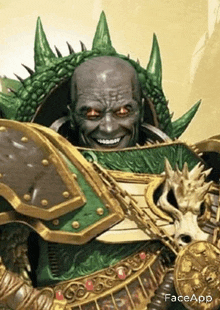a close up of a statue of a warrior with a smile on his face and a skull .