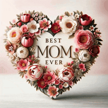 a heart made of flowers with the words " best mom ever " on it