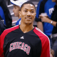 a man wearing a black and red chicago shirt