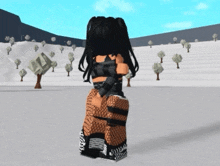 a girl in a black top and fishnet stockings stands in the snow