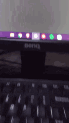 a benq computer monitor with a purple screen