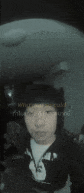 a blurry picture of a man with the words " why you so cold " written below him