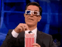 Colbert Popcorn GIF - Colbert Popcorn Movie GIFs