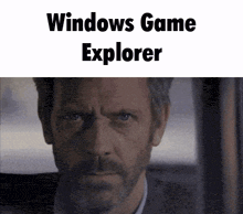 a man with a beard is looking out a window with the words windows game explorer above him