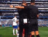 a soccer player wearing number 10 stands on the field