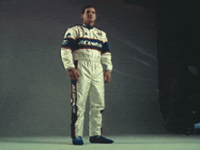 a man in a race suit with acdelco written on it