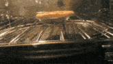 a pie is being cooked in an oven with a glass dish