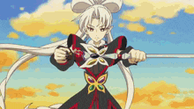 a cartoon character is holding a sword with a flower on it