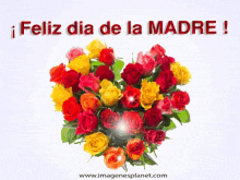 a bouquet of roses in the shape of a heart with the words feliz dia de la madre below it