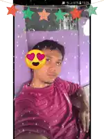 a man is taking a selfie with a heart shaped smiley face on his face