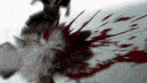 a blurry picture of a person 's face with blood coming out of it