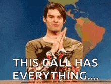 a man is sitting at a desk with his hands folded in front of a map of the world and says `` this call has everything ... ''