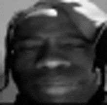 a close up of a person 's face with their eyes closed .