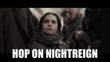 a woman is standing in a crowd with the words hop on nightreign written on the bottom