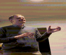 a pixelated image of a man with a beard