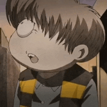 a close up of a cartoon character 's face with his mouth open .