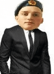 a man in a suit and tie with a beret on his head is standing in front of a white background .