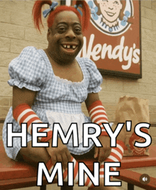 a wendy 's sign with a person dressed as wendy in front of it