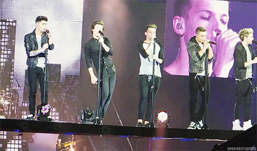 one direction singing on stage