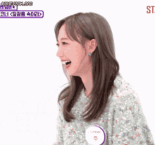 a woman with a name tag that says ' k ' on it