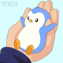 a person is holding a small blue and white penguin in their hands with pengu written on the bottom