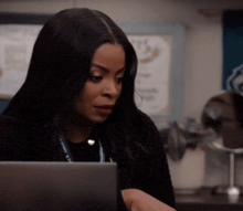 a woman with a lanyard around her neck that says " i love you "