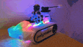 a toy that says polymaker on it is sitting on a table