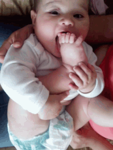 Baby Eating GIF - Baby Eating Feet GIFs