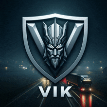 a truck is driving down a highway in front of a shield that says " vik "