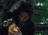 a woman in a black hat is being touched by a man