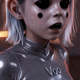 a close up of a person 's face with the word voo on the chest