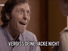 a man says vergiss deine jacke nicht in a german language