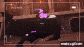 a video of a person playing a video game with a purple light coming out of it .