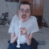 Playing The Flute Ricky Berwick GIF - Playing The Flute Ricky Berwick Making Music GIFs