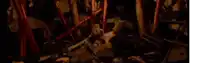 a person is standing in a room with a lot of blood coming out of it .
