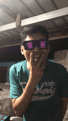 a man wearing sunglasses and a t-shirt that says today
