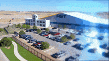 an aerial view of a large building with the word ast on it